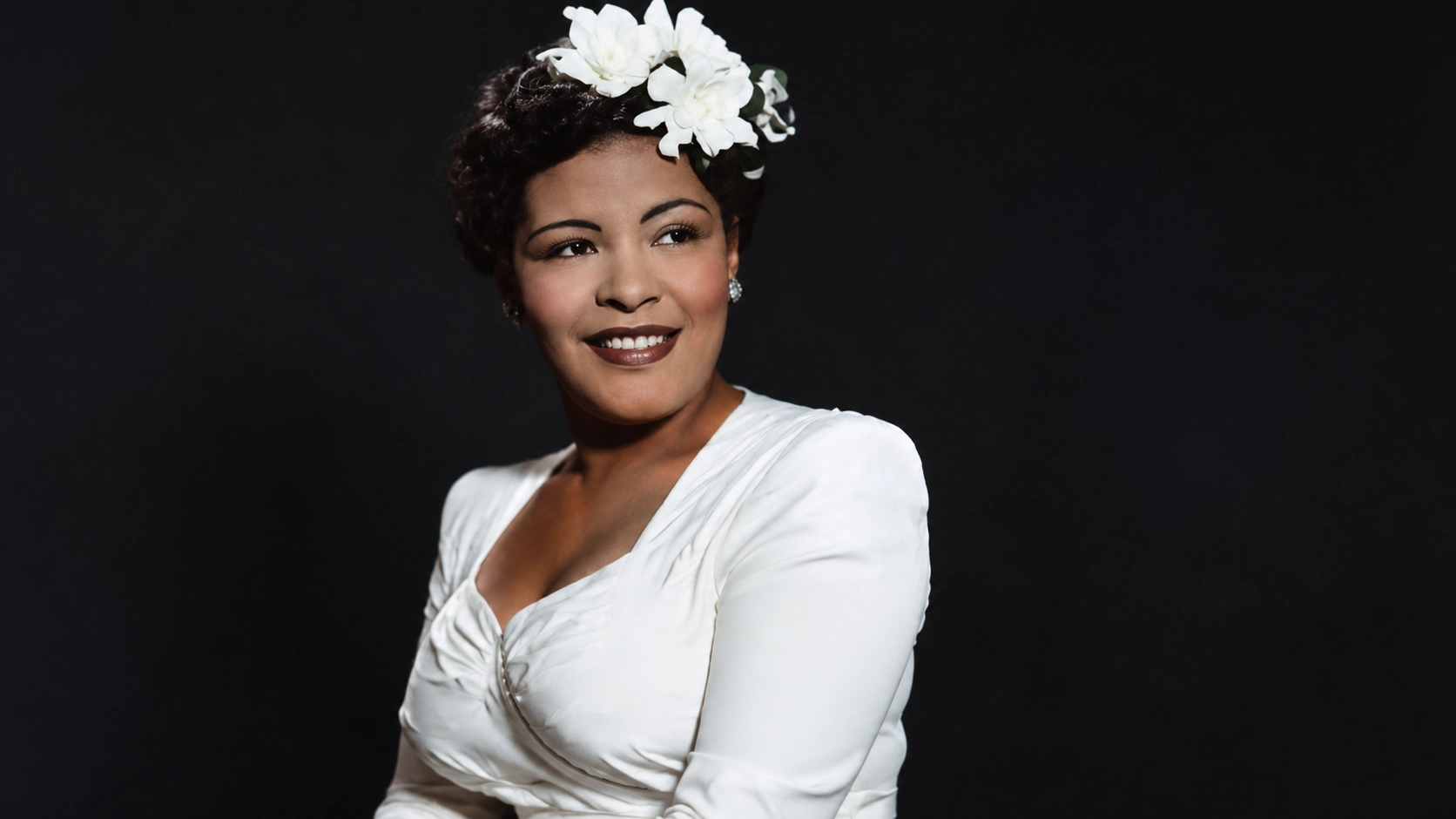 image for female singers who died of an overdose, showing a vintage-style black woman in a white dress