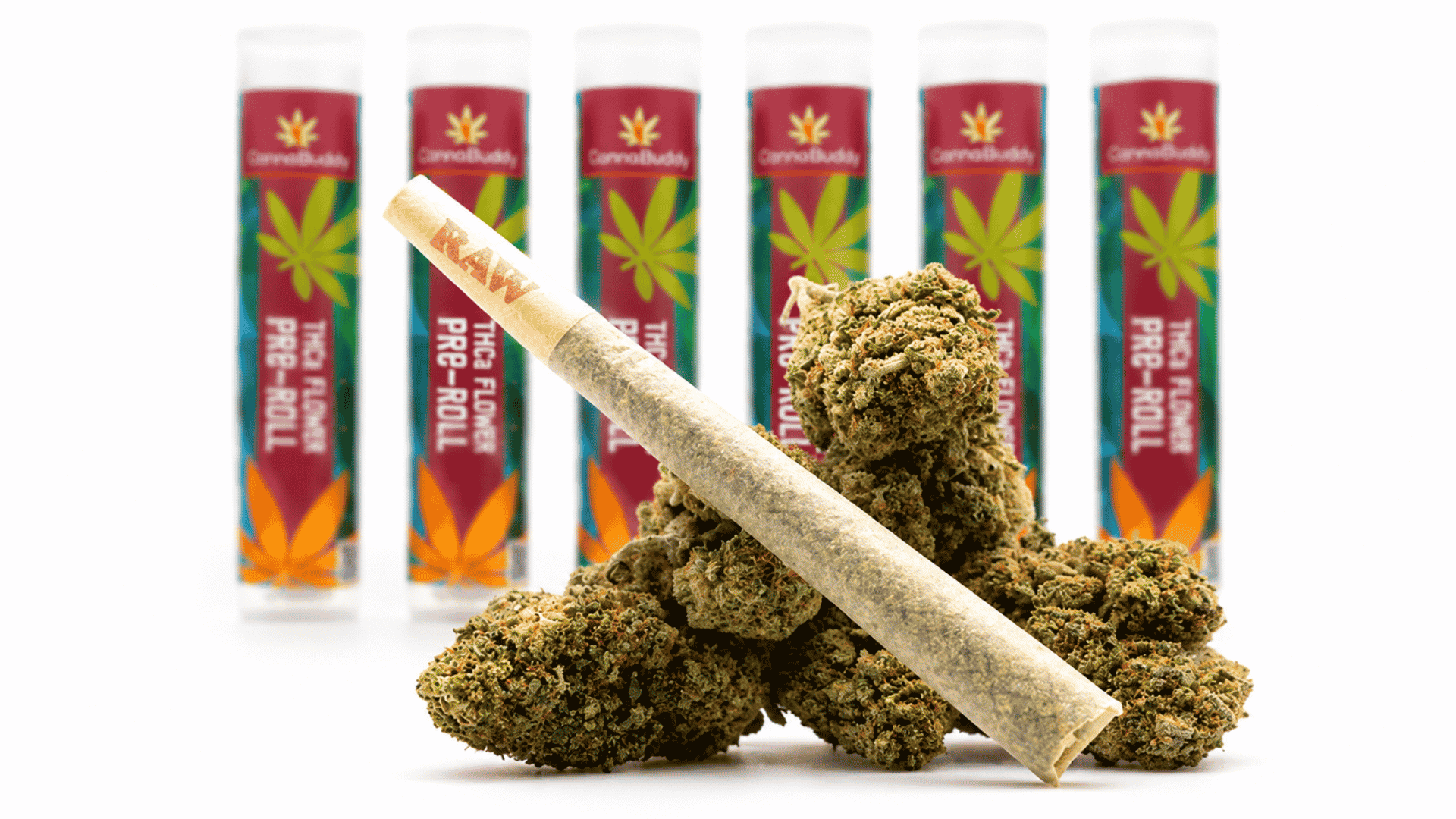 blockberry cannabis buds with a filled pre roll in front of colorful product tubes on a white background